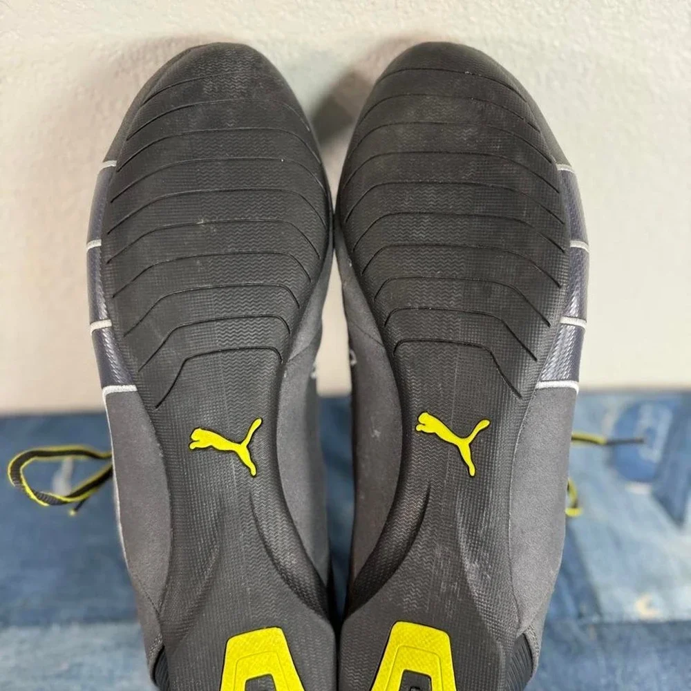 Puma black and yellow sneakers
